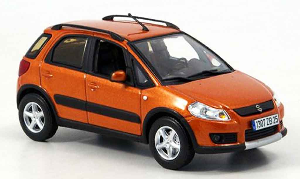Suzuki SX4 1/43 Norev oranje 2006 modelauto