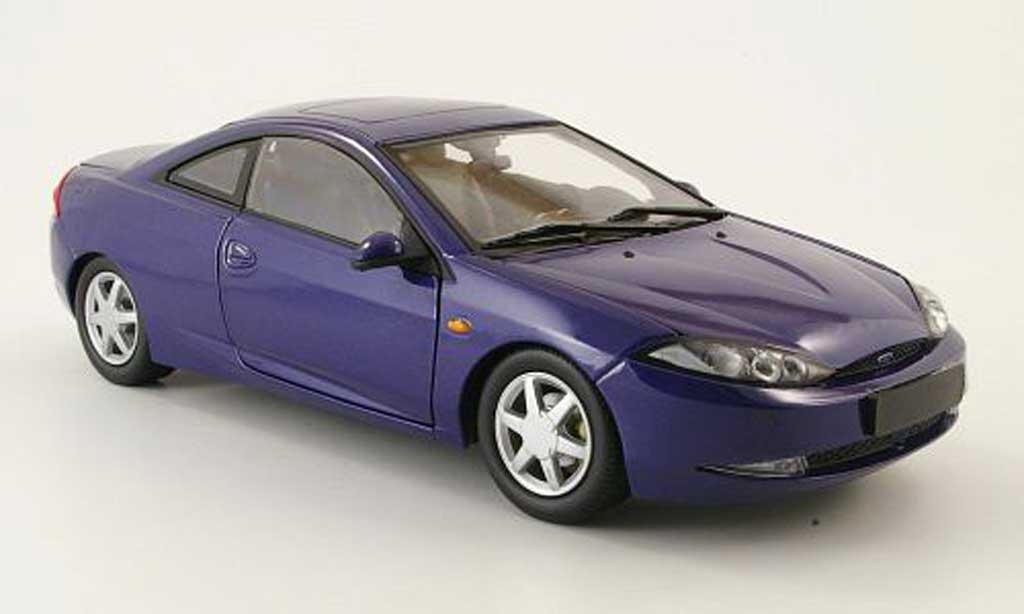Ford Cougar 1/18 Action Performance blauw modelauto