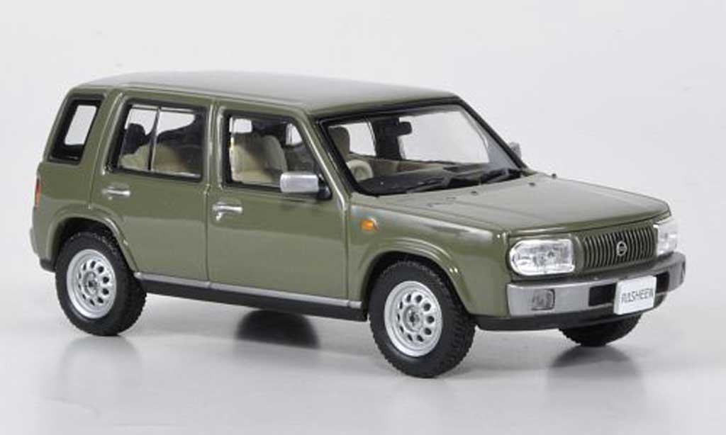 Nissan Rasheen 1/43 Norev Typ I grijsgrun RHD 1997 modelauto