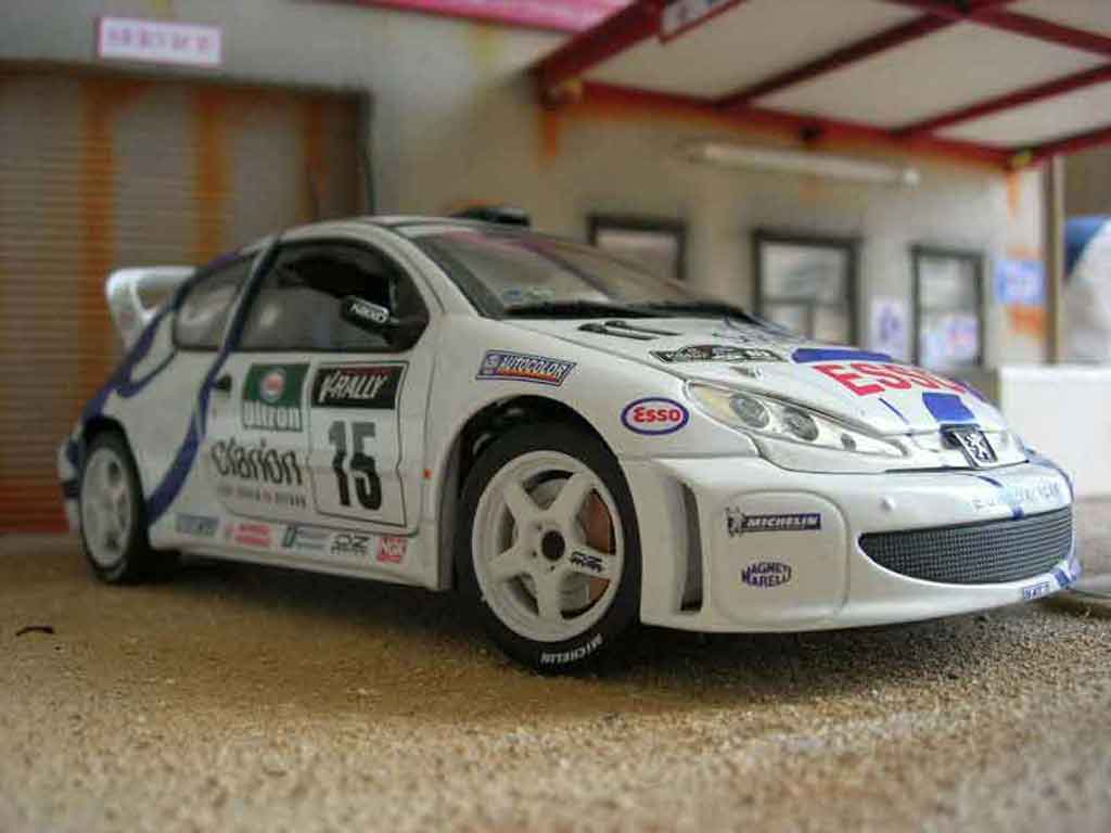 Peugeot 206 WRC 1999 # 15 Clarion Panizzi wit 1/18 Solido