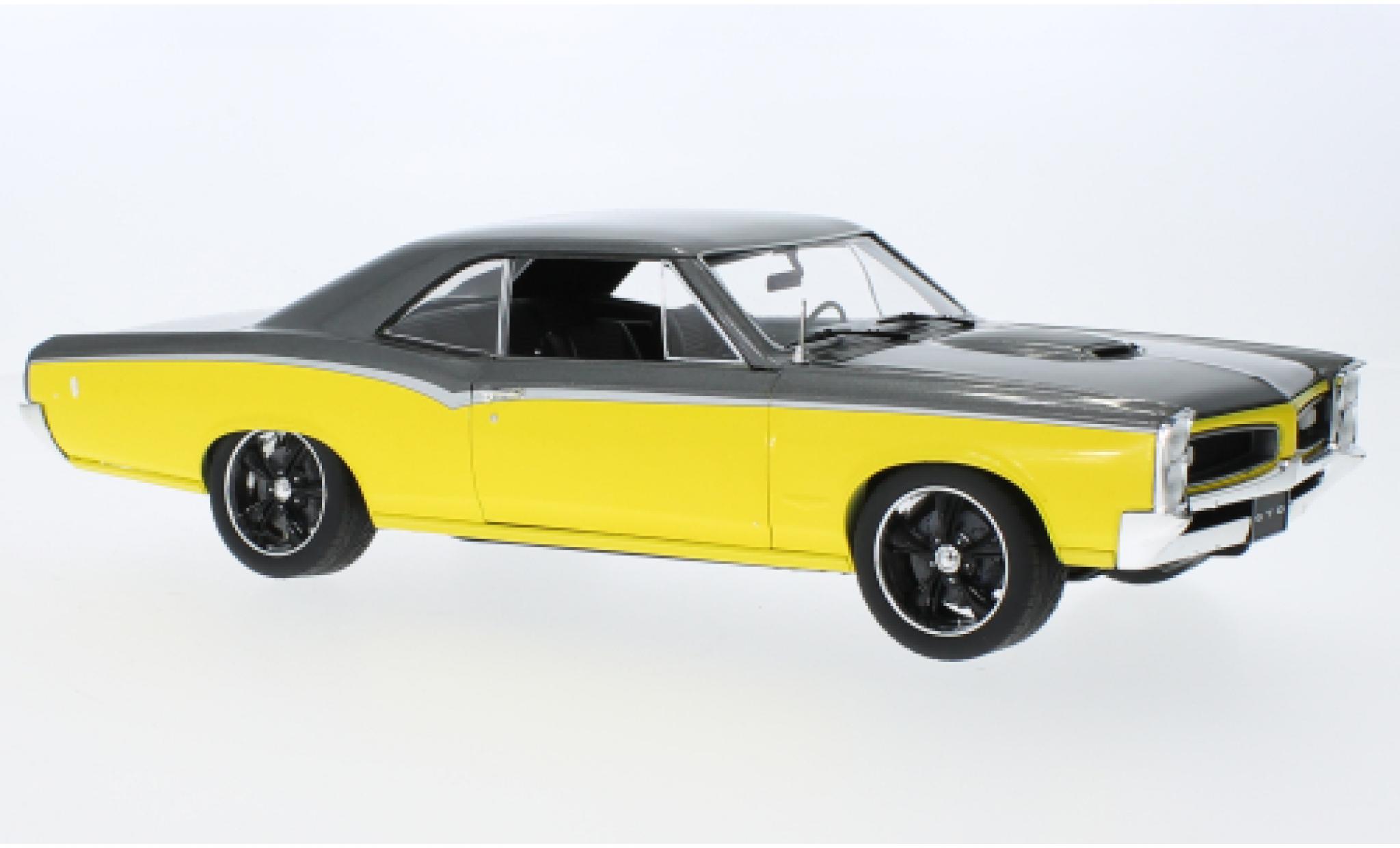 Pontiac GTO 1/18 ACME Restomod geel/zwart 1966 modelauto