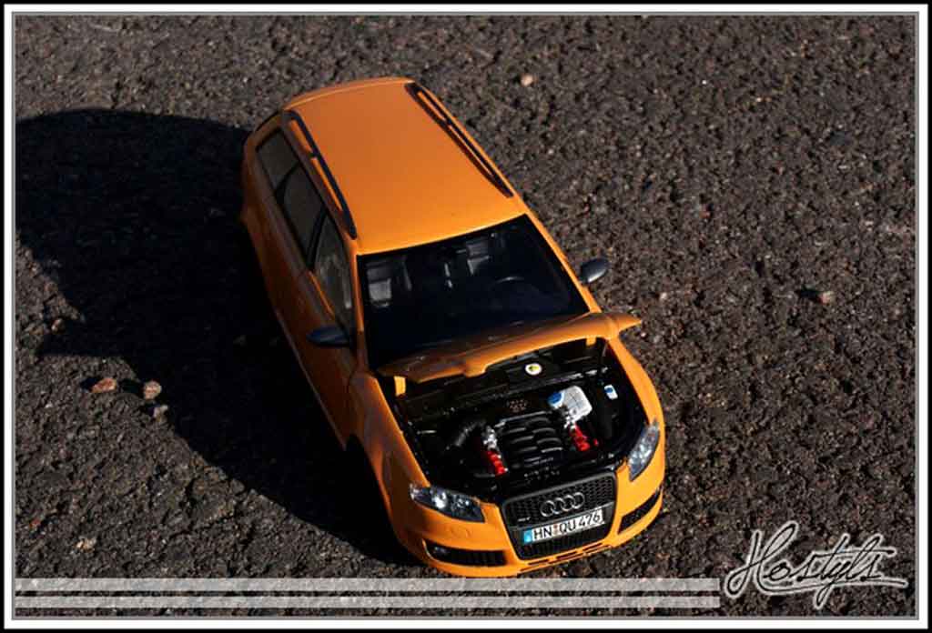 Audi RS4 avant oranje papaye 1/18 Minichamps