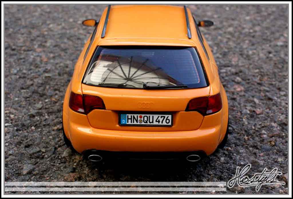 Audi RS4 avant oranje papaye 1/18 Minichamps