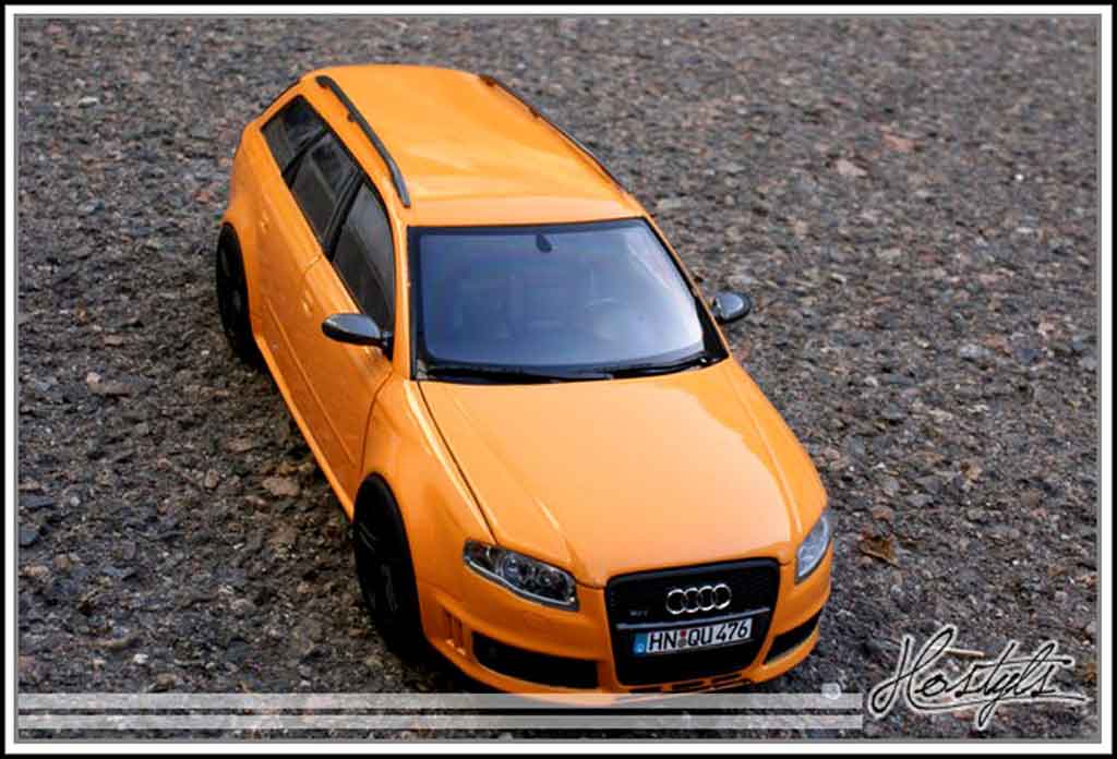 Audi RS4 avant oranje papaye 1/18 Minichamps