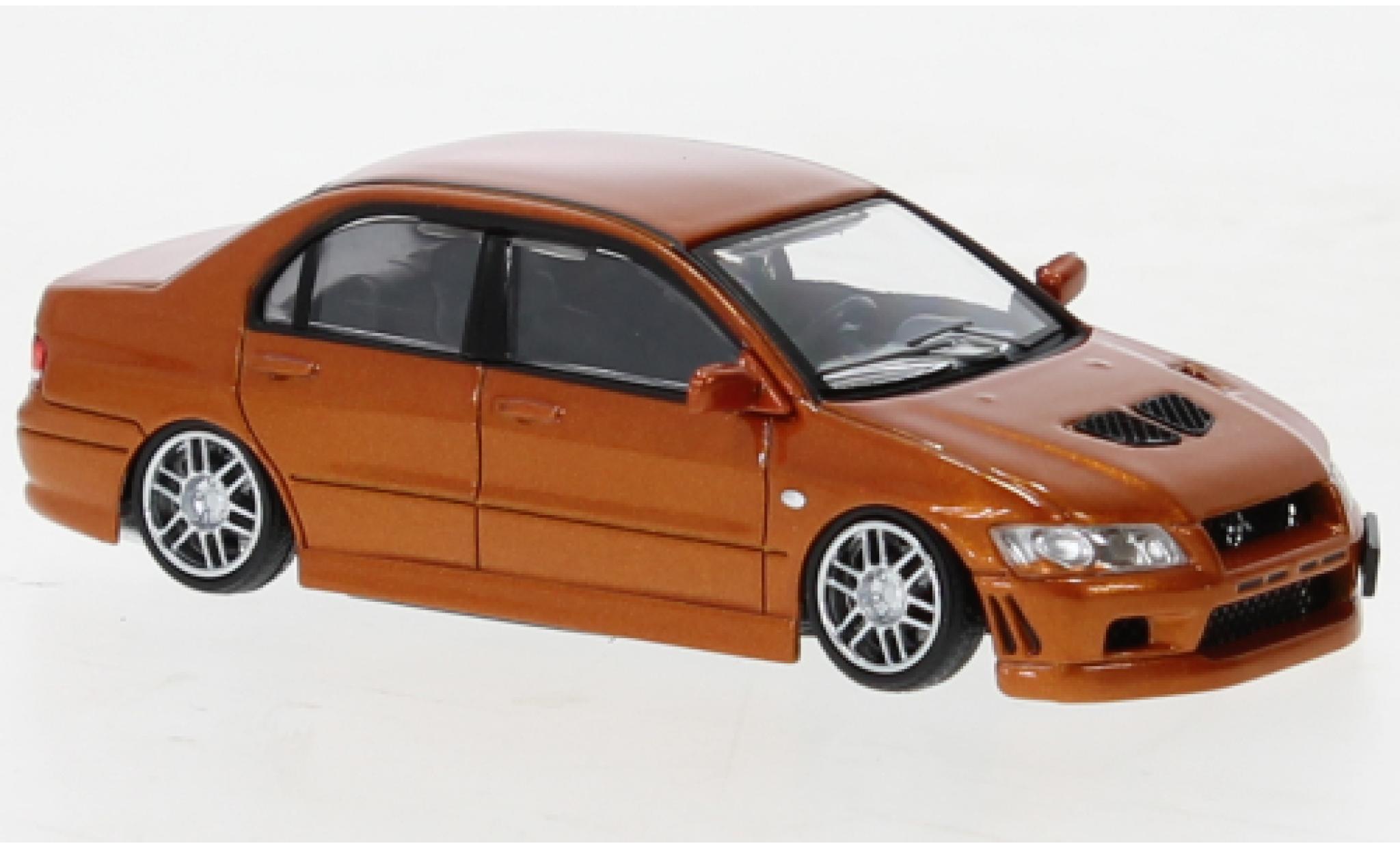 Mitsubishi Lancer 1/64 BM Creations &eacute;volution VII metallic oranje 2001 modelauto