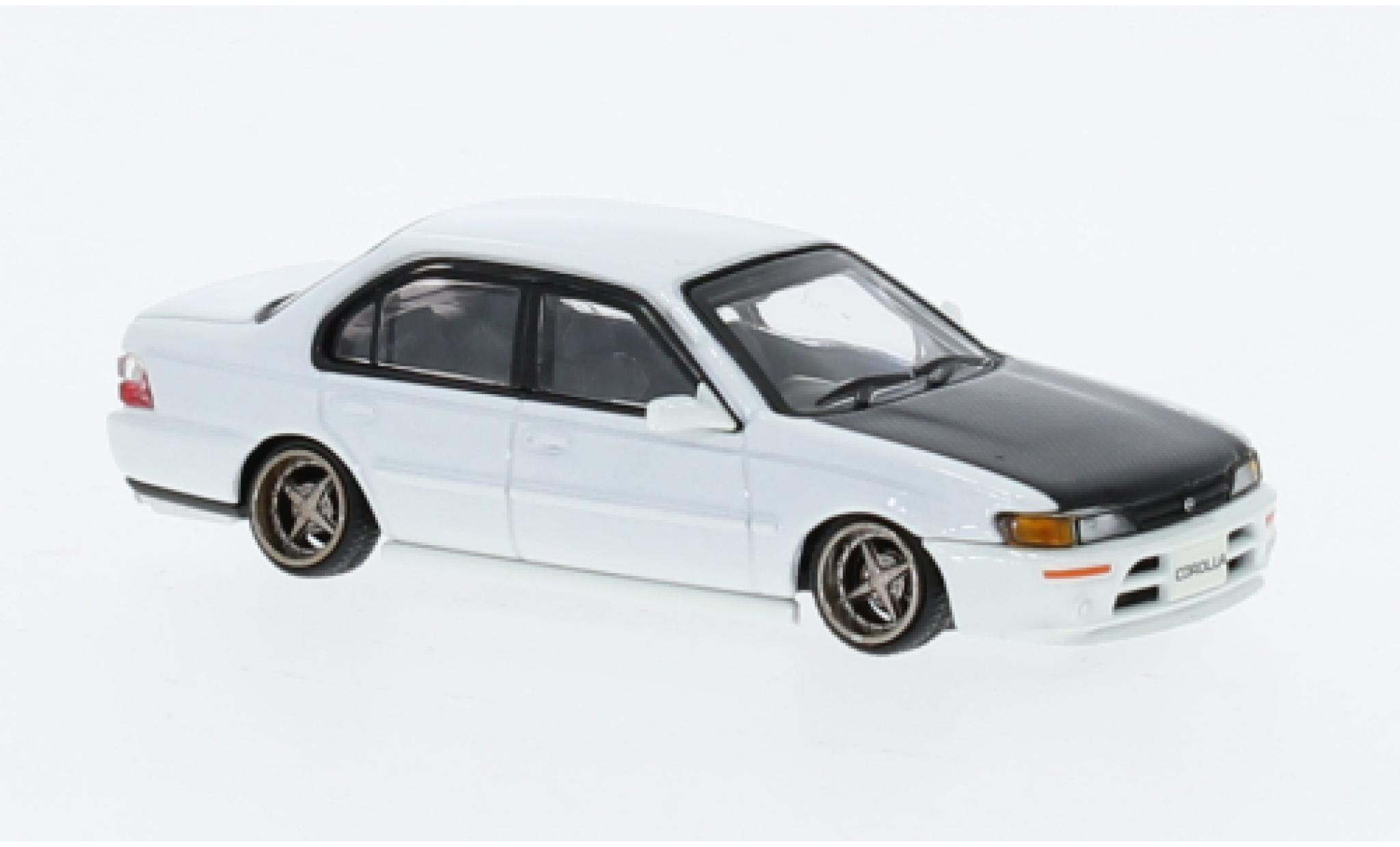 Toyota Corolla 1/64 BM Creations (AE100) wit 1996 modelauto