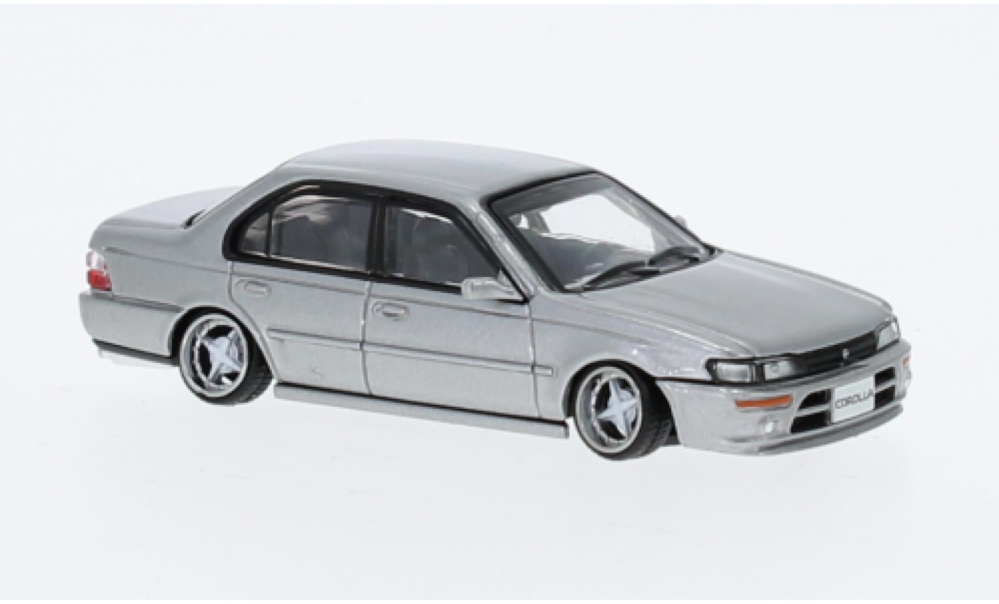 Toyota Corolla 1/64 BM Creations (AE100) metallic grijs 1996 modelauto