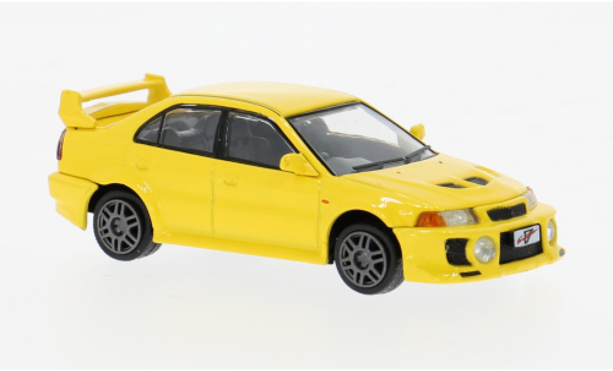 Mitsubishi Lancer 1/64 BM Creations EVO V geel 1:64 modelauto
