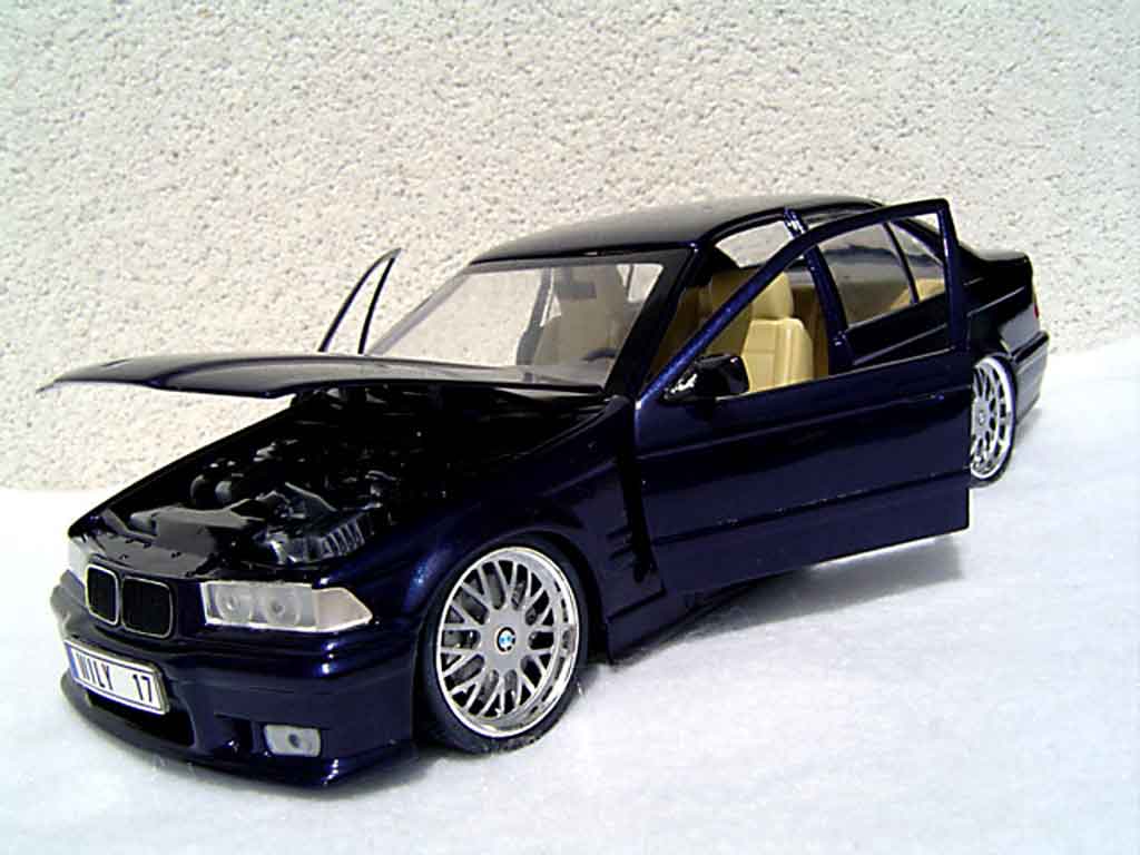 Bmw 325 kit m3 E36 sedan tds blauw metallized 1/18 Ut Models