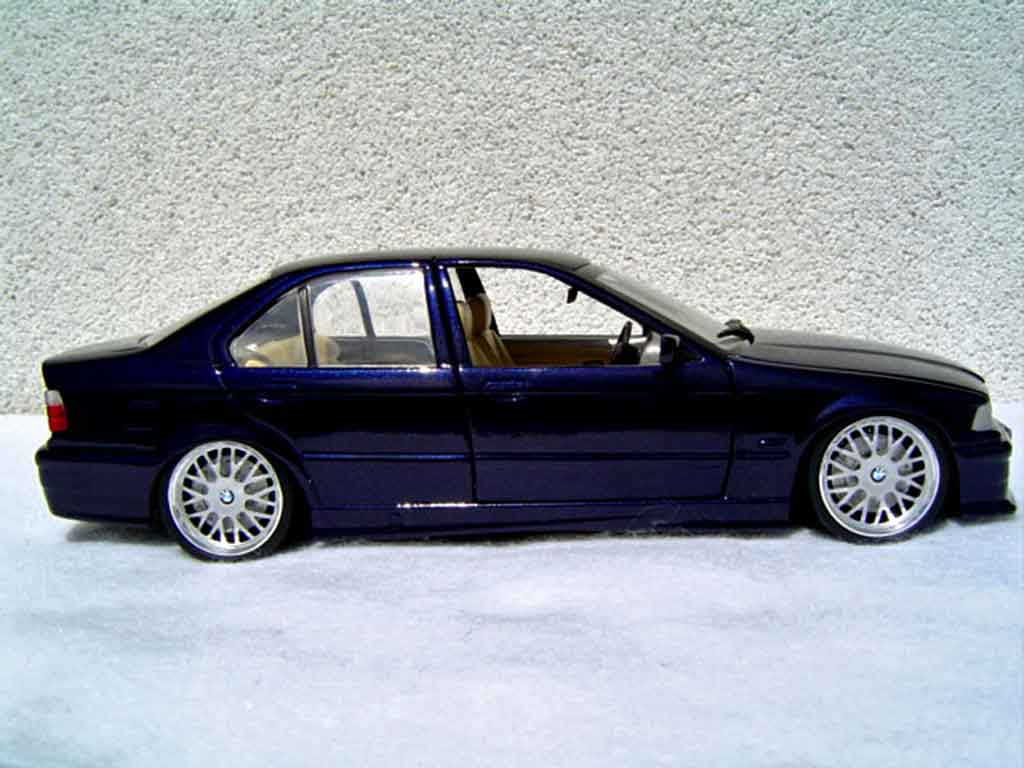 Bmw 325 kit m3 E36 sedan tds blauw metallized 1/18 Ut Models