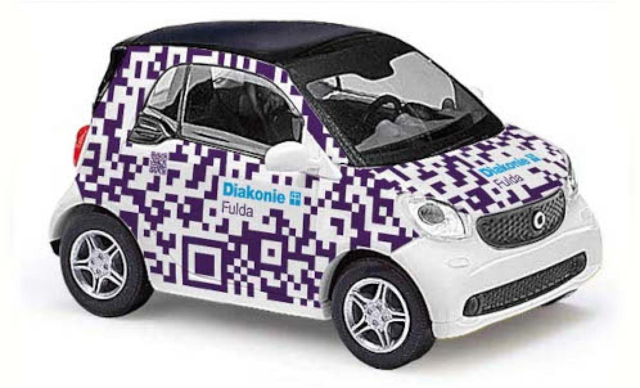 Smart ForTwo 1/87 Busch Fortwo Diakonie Fulda 2014 modelauto