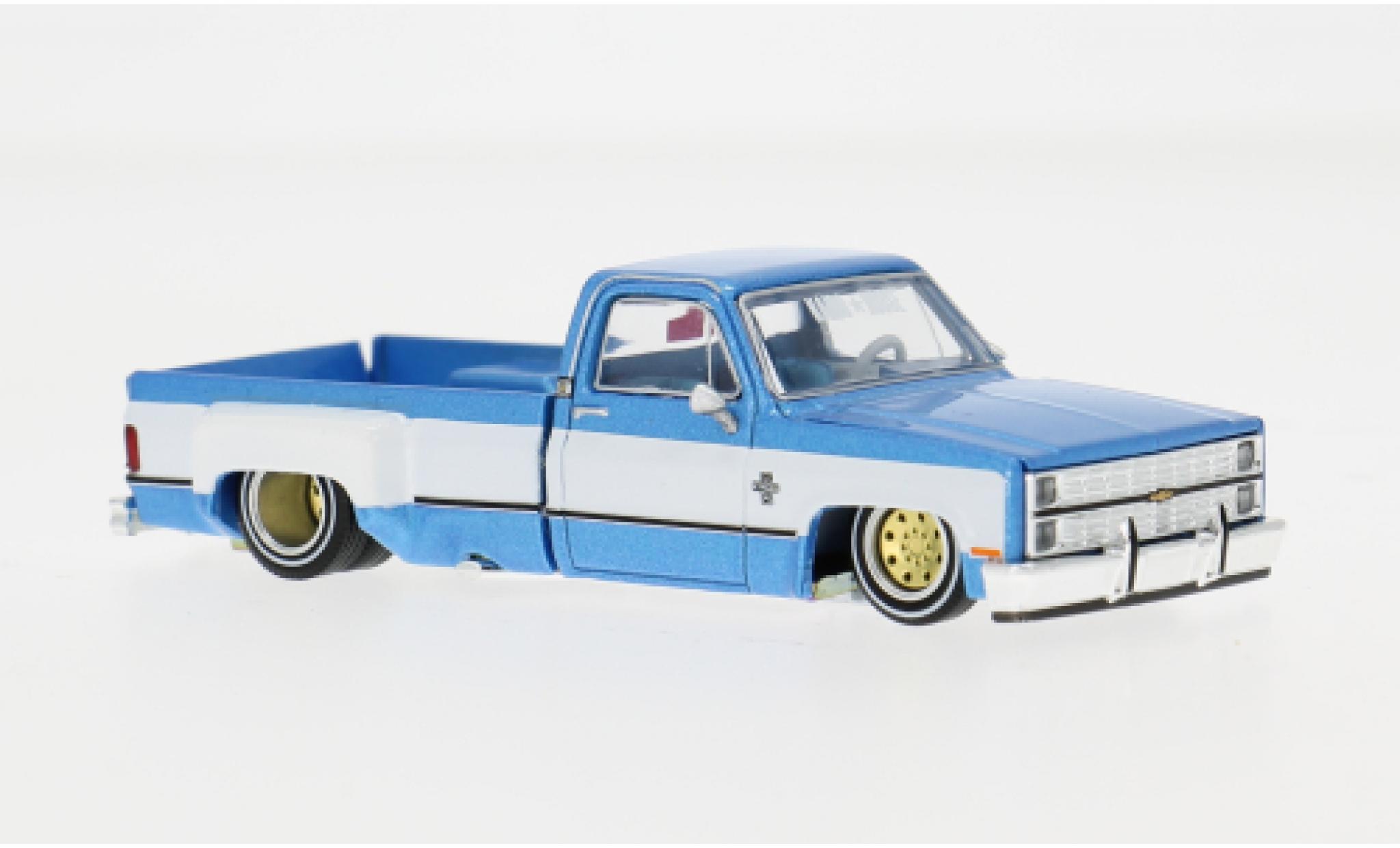 Chevrolet Silverado 1/64 Mini GT Dually Vintage Spec V1 blauw/wit 1:64 modelauto
