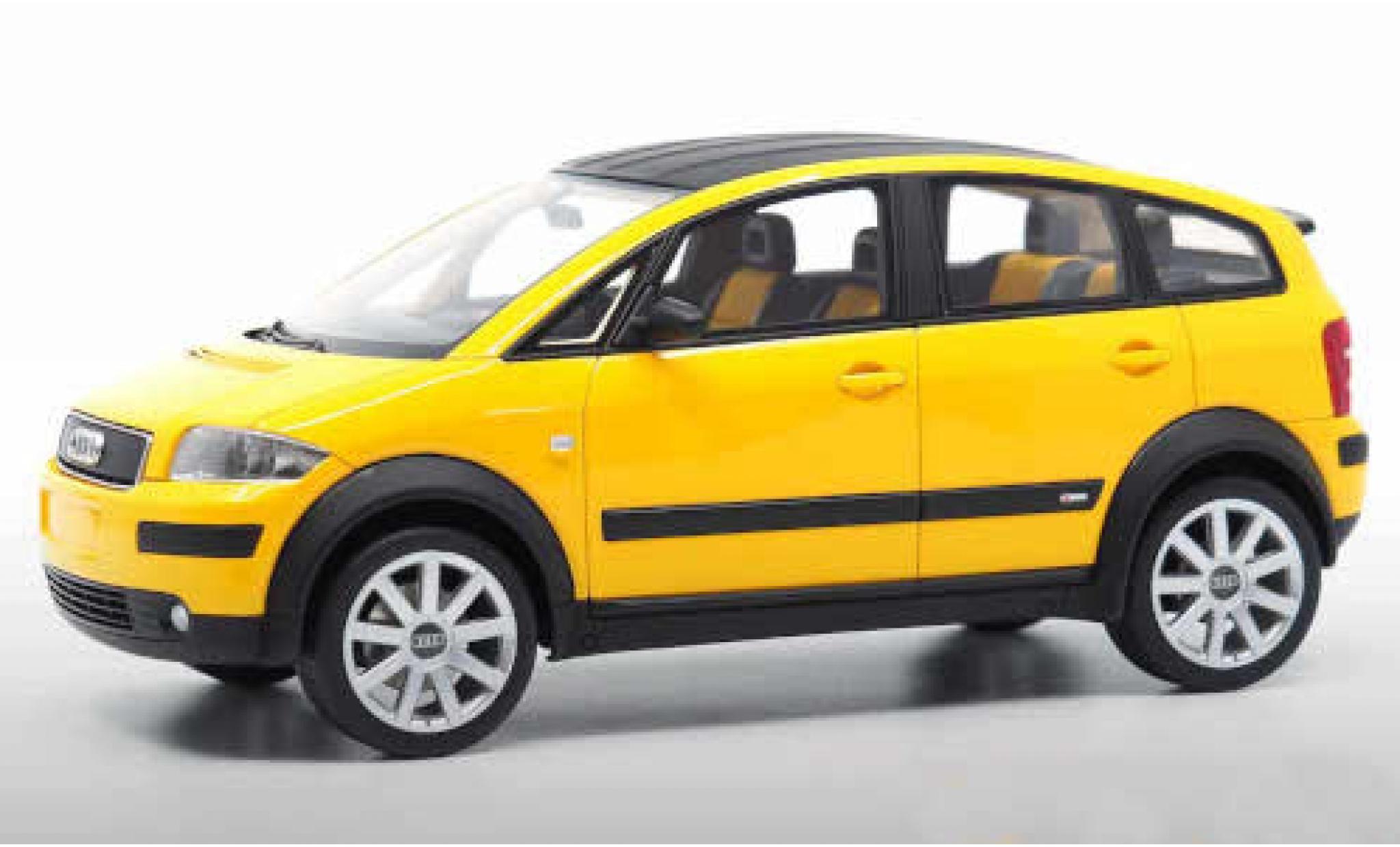Audi A2 1/18 DNA Collectibles geel modelauto