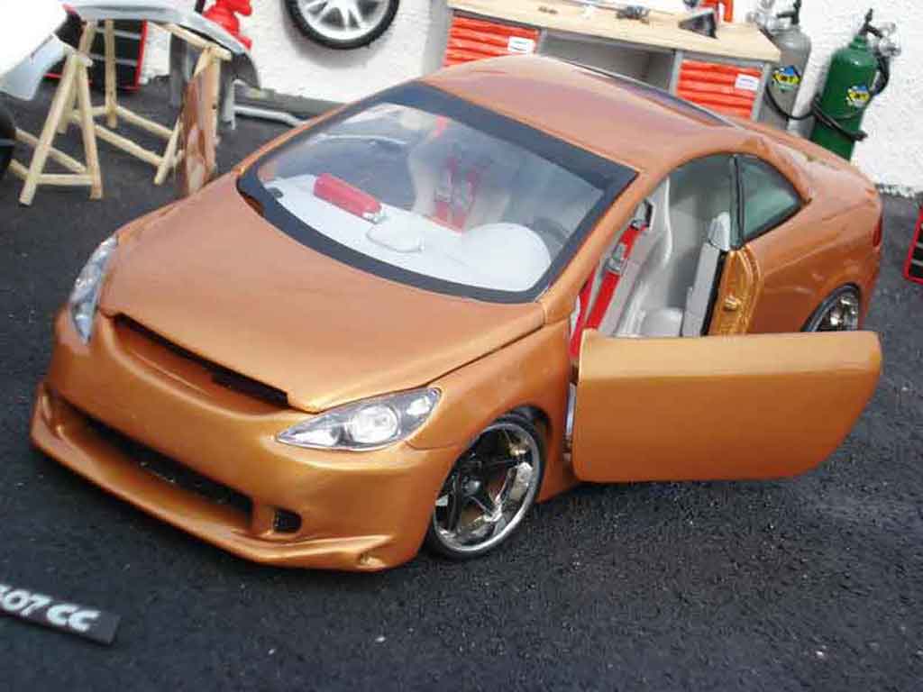 Peugeot 307 CC 1/18 Solido CC oranje modelauto