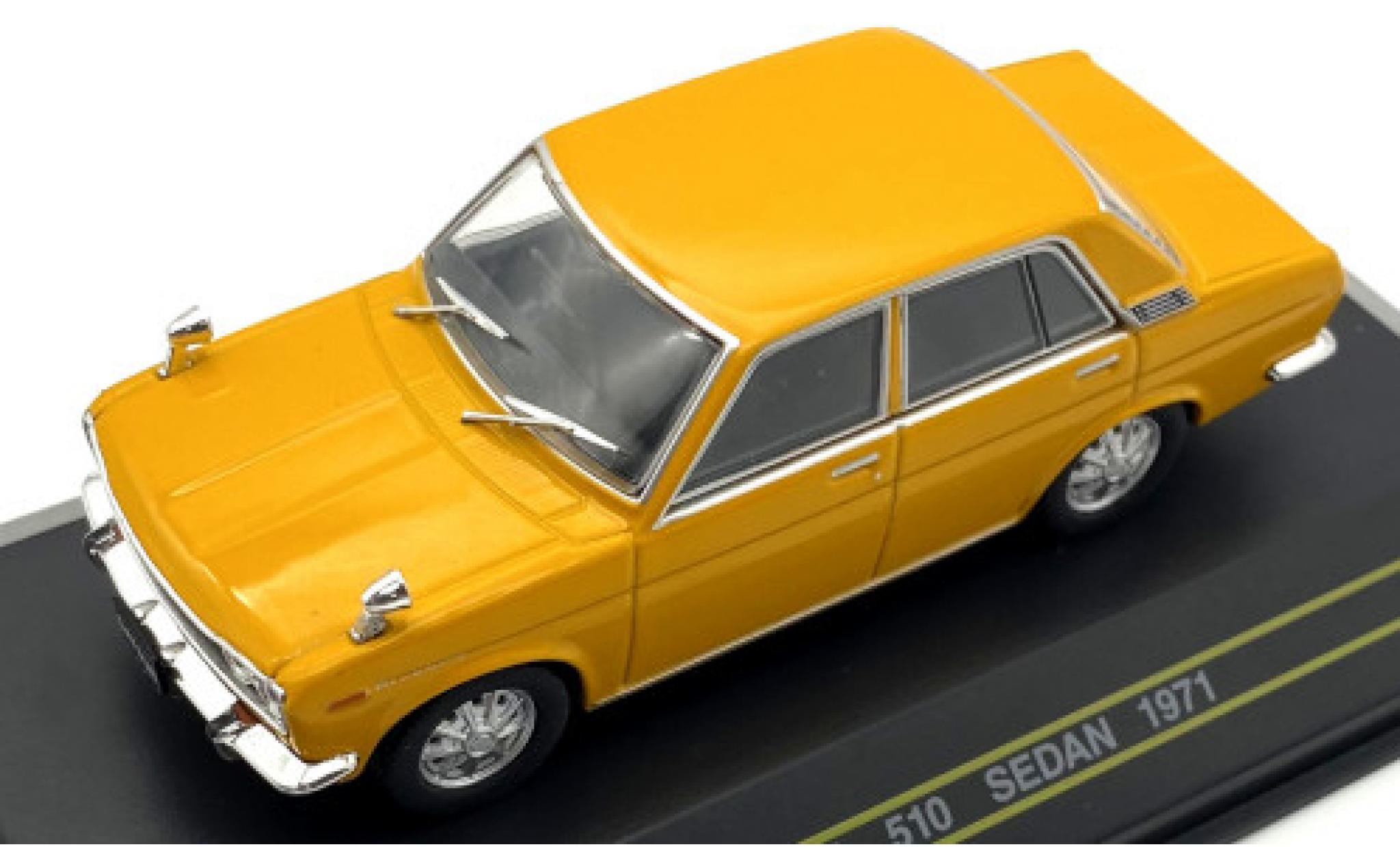 Datsun 510 1/43 First 43 Models Sedan geel RHD 1971 modelauto