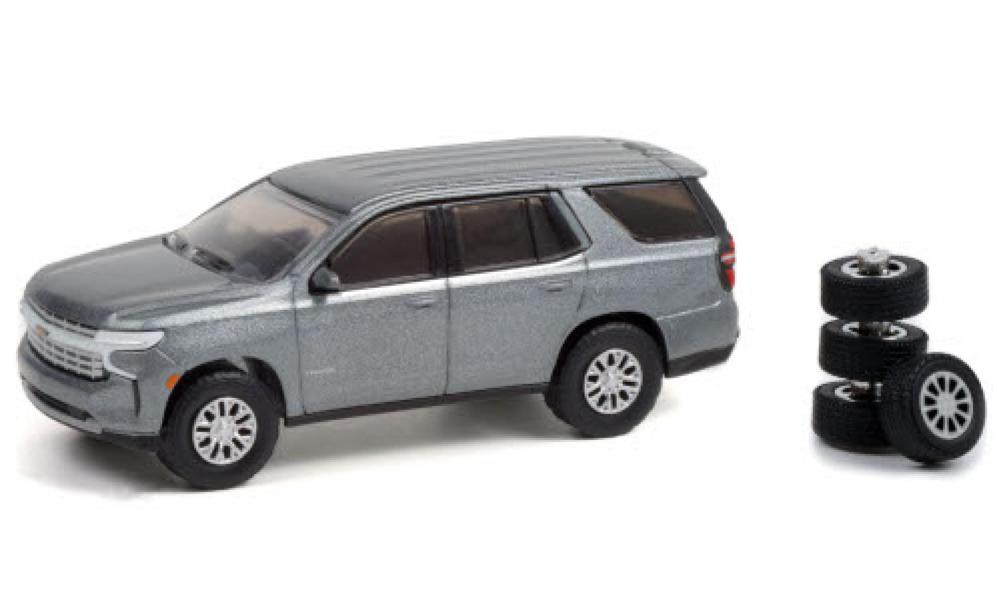 Chevrolet Tahoe 1/64 Greenlight metallic grijs 2021 avec Ersatzr&auml;dern modelauto