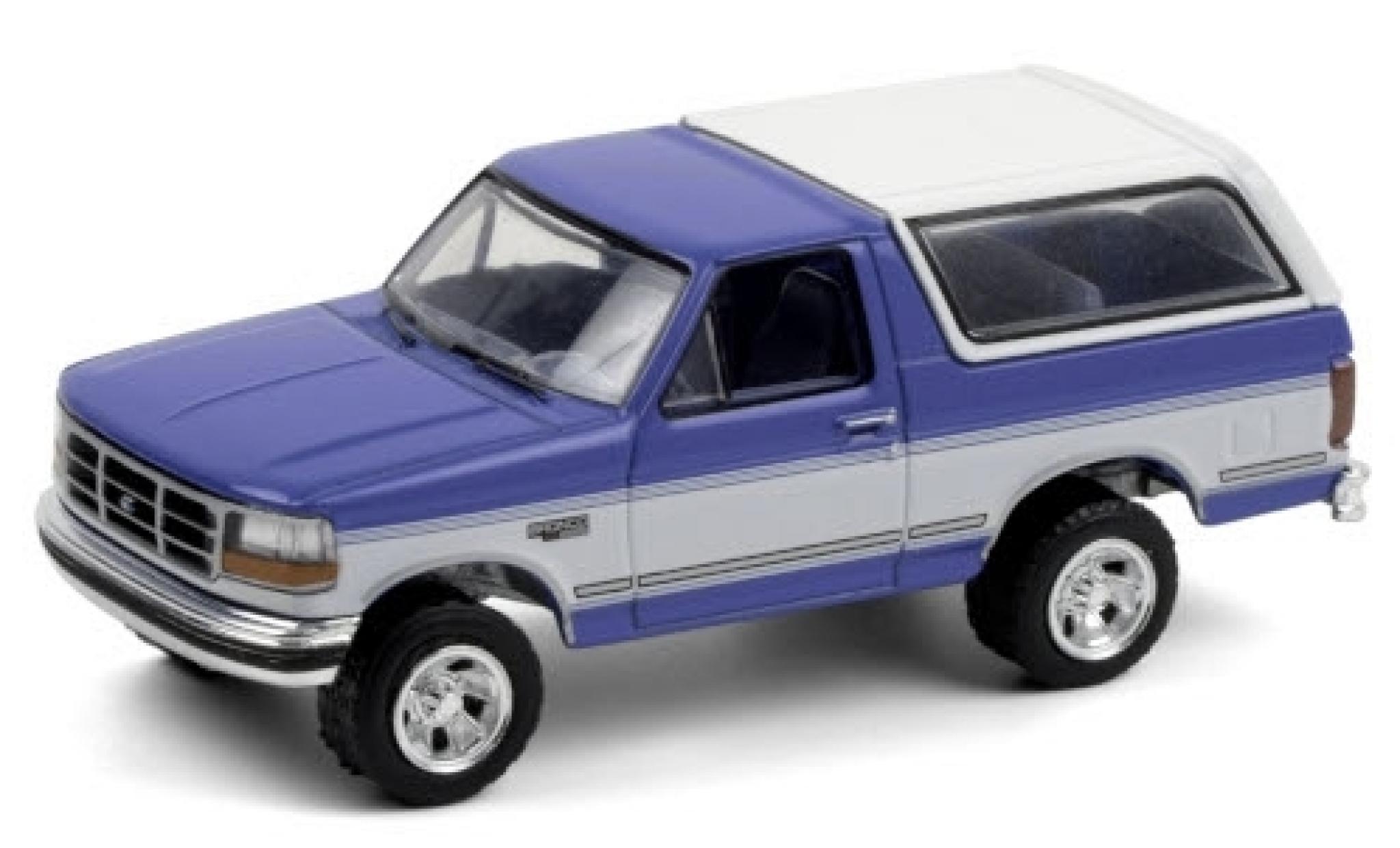 Ford Bronco 1/64 Greenlight XLT metallic blauw/wit 1992 modelauto
