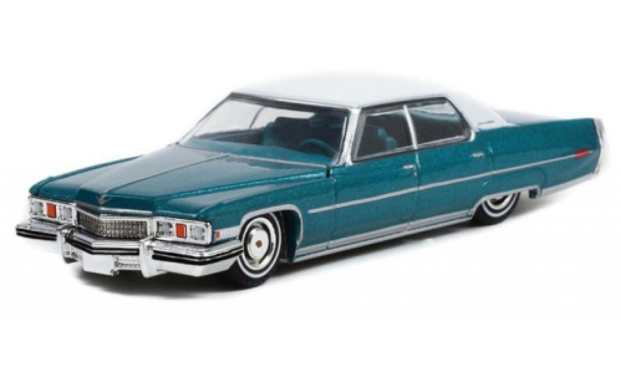 Cadillac Sedan 1/64 Greenlight DeVille Lowrider metallic turquoise/wit 1973 modelauto