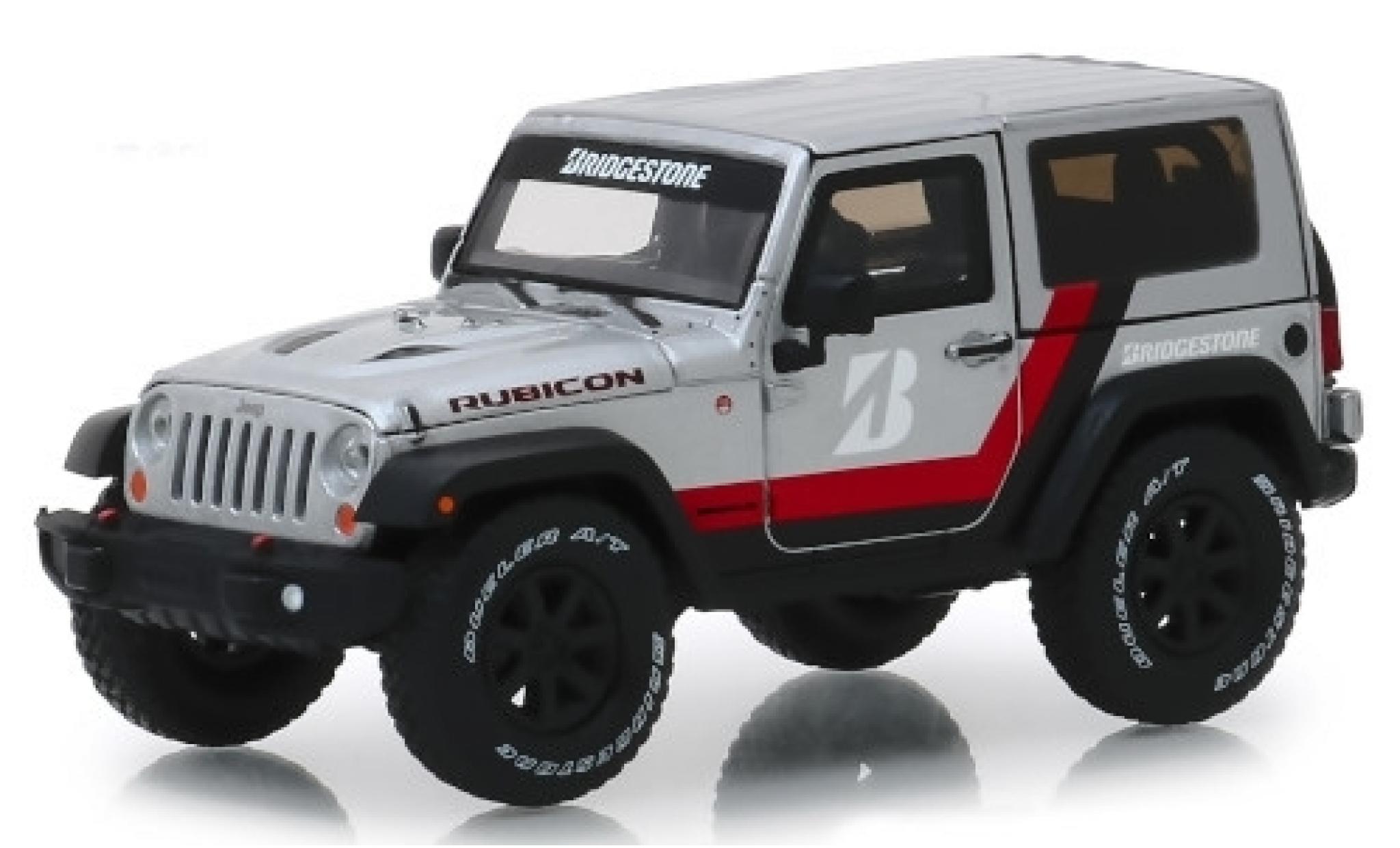 Jeep Wrangler 1/43 Greenlight Rubicon grijs/Dekor Bridgestone 2014 modelauto