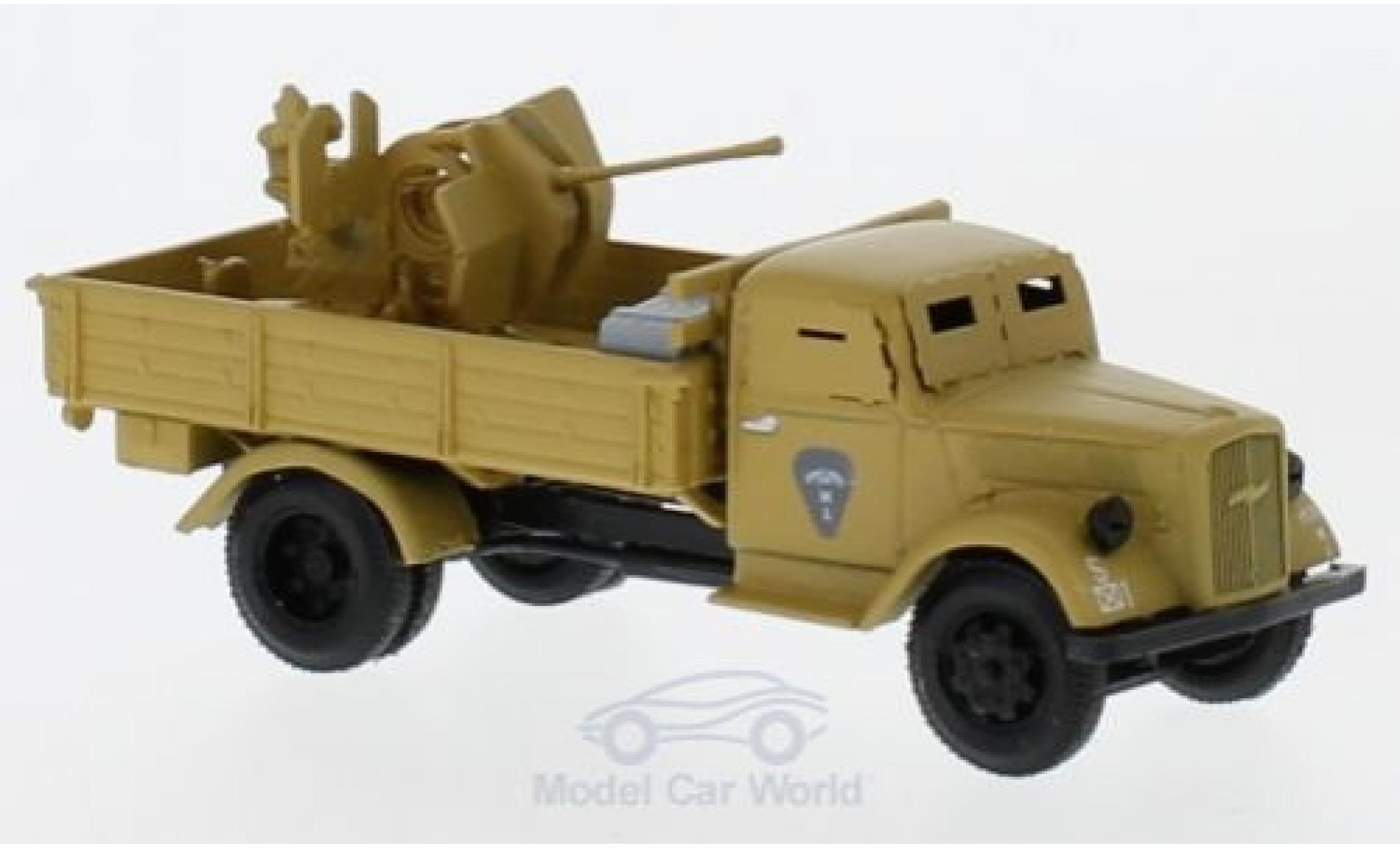 Opel Blitz 1/87 Herpa bruin gepanzert mit 20mm Kanone modelauto
