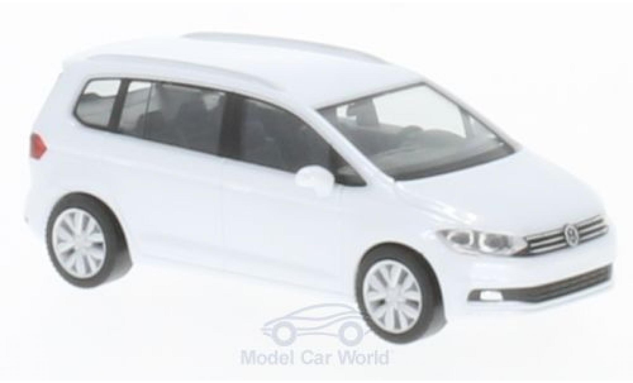 Volkswagen Touran 1/87 Herpa metallic wit modelauto