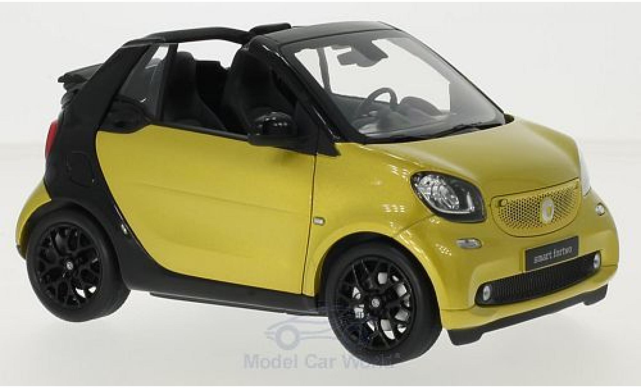 Smart ForTwo 1/18 Norev fortwo Cabrio (A453) metallic geel/zwart Softtop liegt bei modelauto