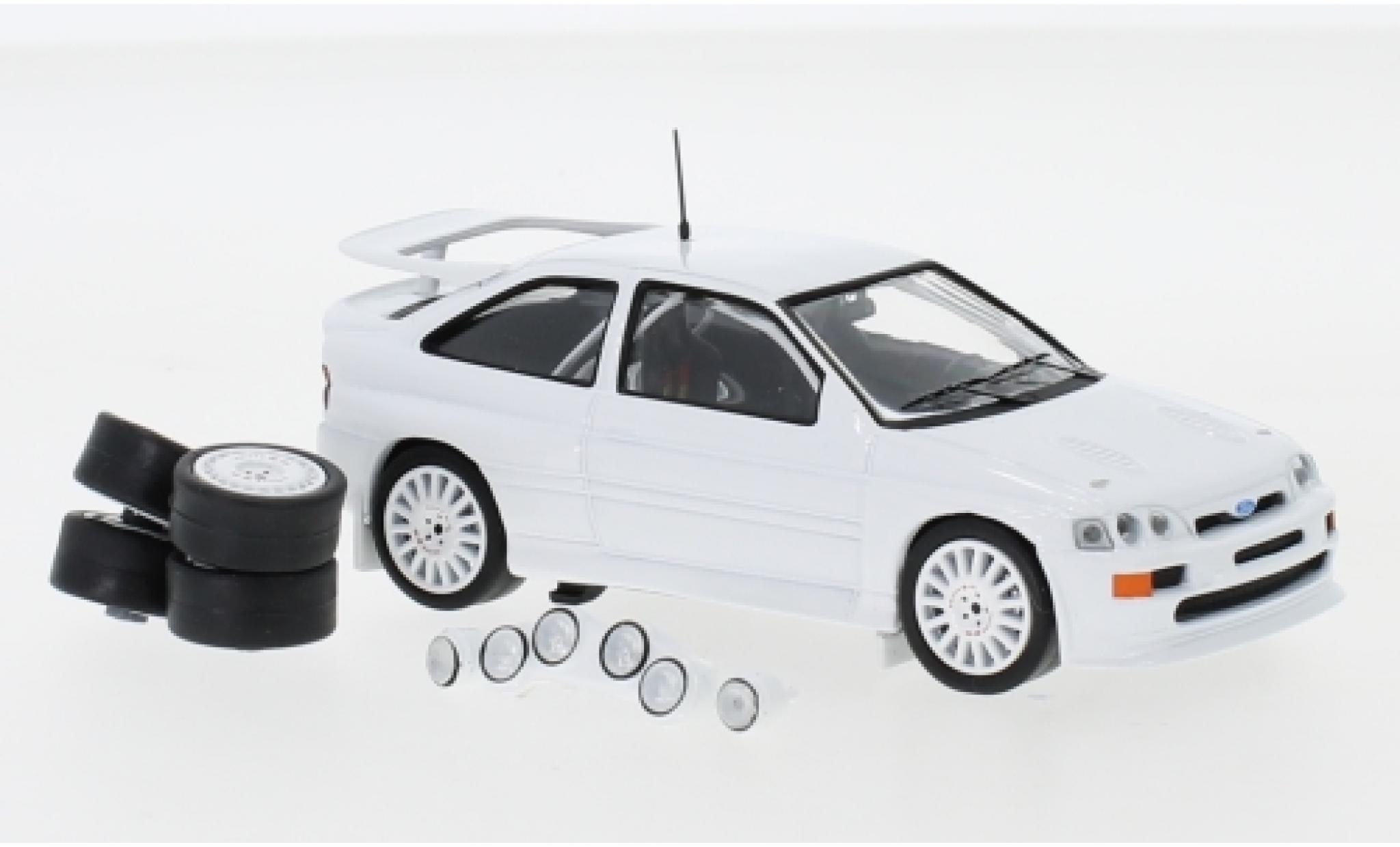 Ford Escort 1/43 IXO RS Cosworth wit 1994 Plain Body Version y compris les 4 Ersatzr&auml;der et extra Scheinwerfer modelauto