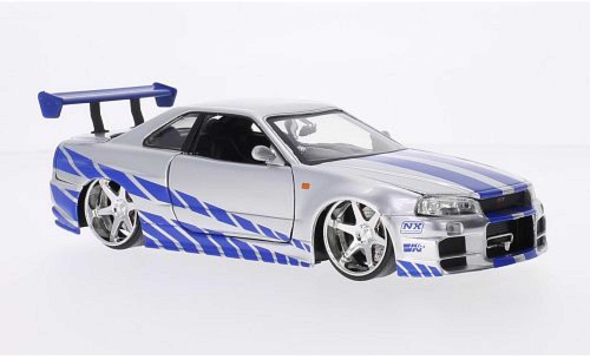 Nissan Skyline 1/24 Jada Toys GT-R (R34) Tuning grijs/Dekor RHD Fast & Furious 2002 tuning modelauto