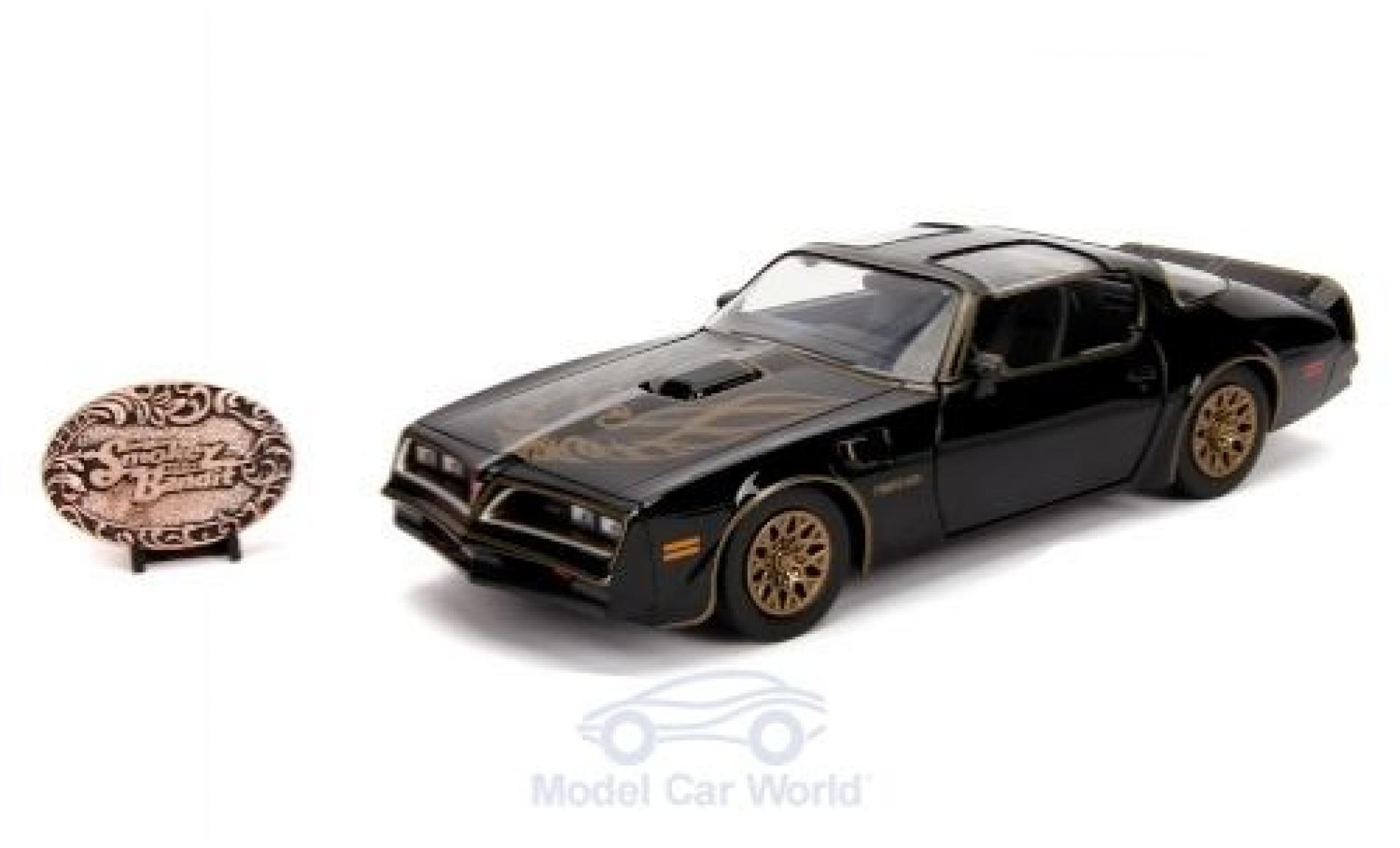 Pontiac Firebird 1/24 Jada Toys Smokey and the Bandit 1977 mit Sammelm&uuml;nze modelauto