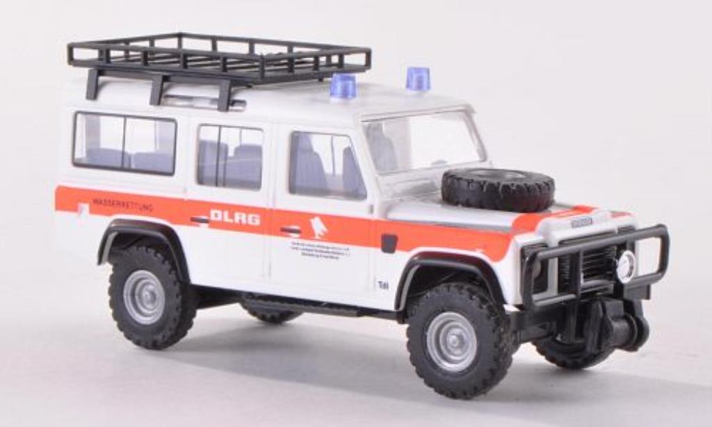 Land Rover Defender 1/87 Busch mit Dachgepacktrager DLRG 1983 modelauto