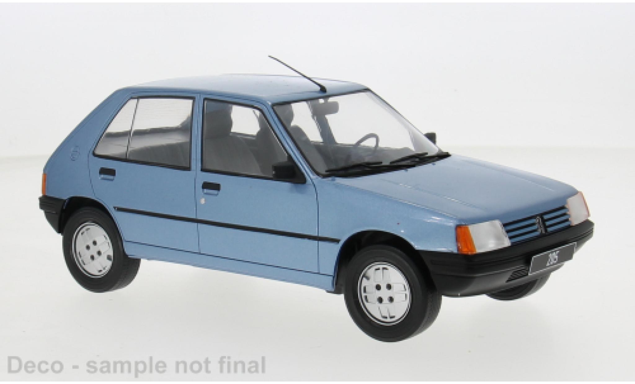 Peugeot 205 1/18 MCG metallic blauw 1984 1:18 modelauto