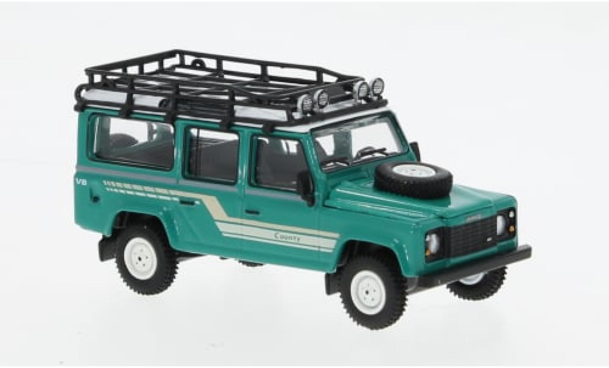 Land Rover Defender 1/64 Mini GT 110 Station Wagon groen/Dekor 1985 1:64 modelauto
