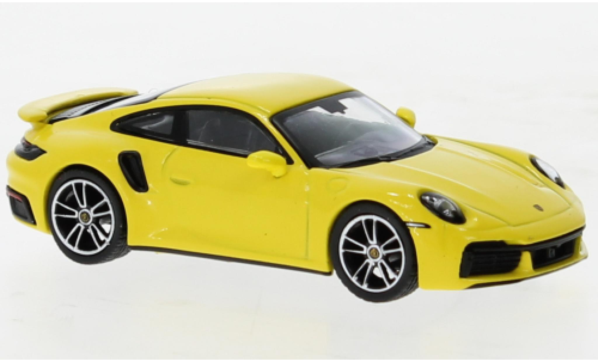 Porsche 992 Turbo s 1/64 Mini GT 911  Turbo S geel modelauto
