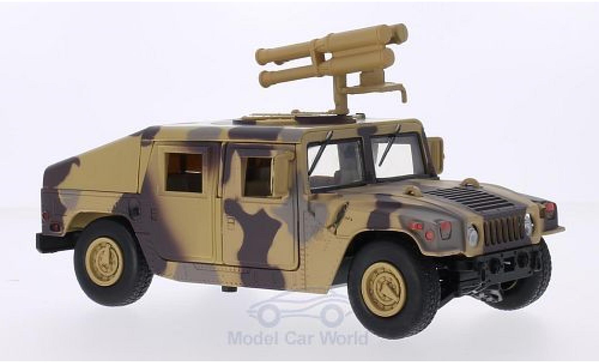 Hummer Humvee 1/24 Motormax mit Starburst Raketenwerfer camouflage modelauto