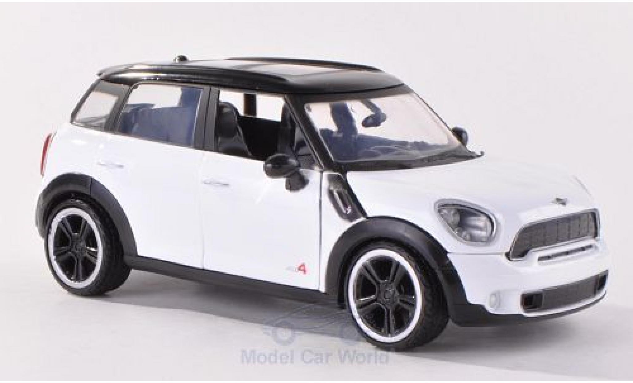 Mini Cooper 1/24 Motormax S Countryman wit/zwart modelauto