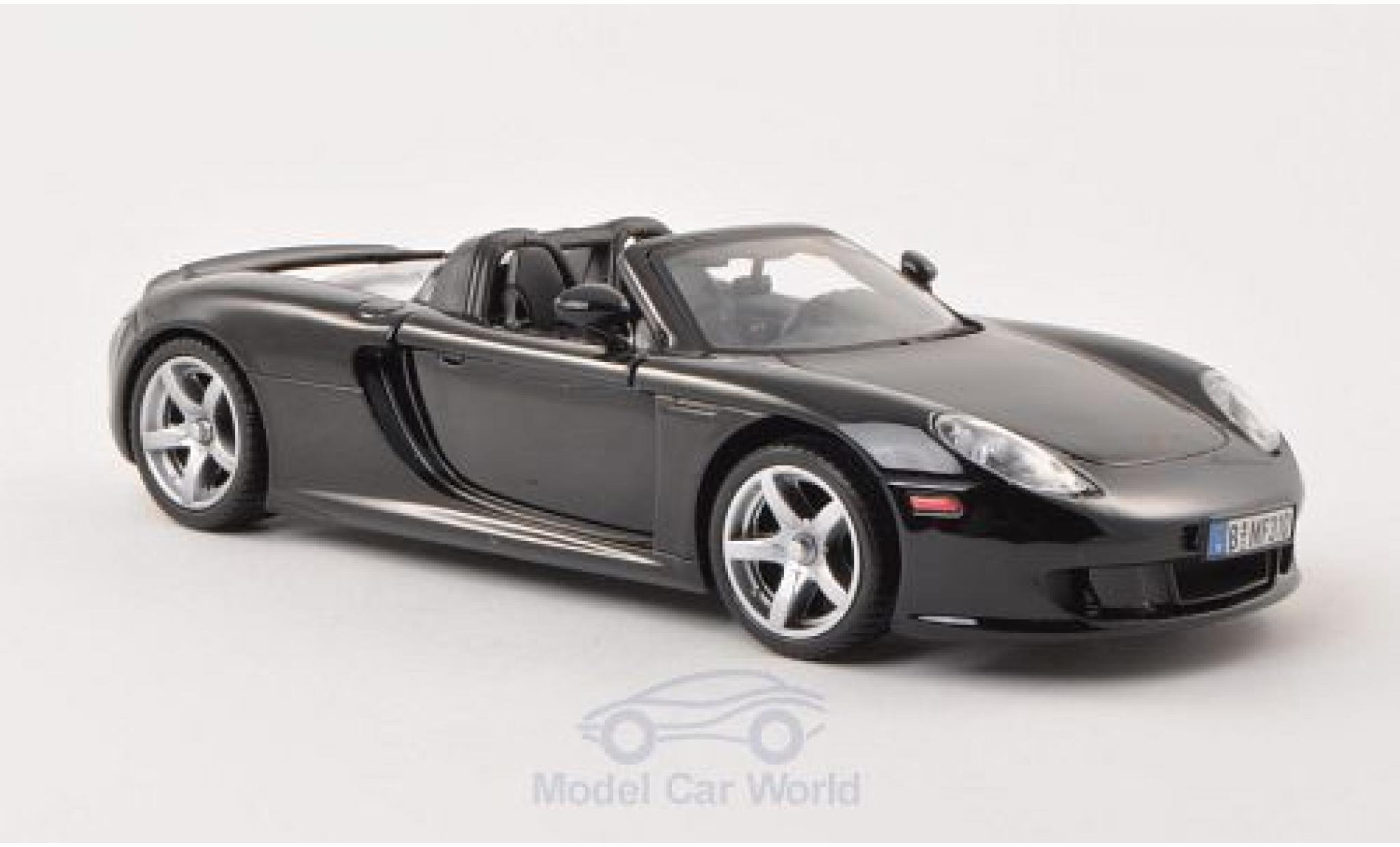 Porsche Carrera GT 1/24 Motormax zwart ohne Vitrine modelauto