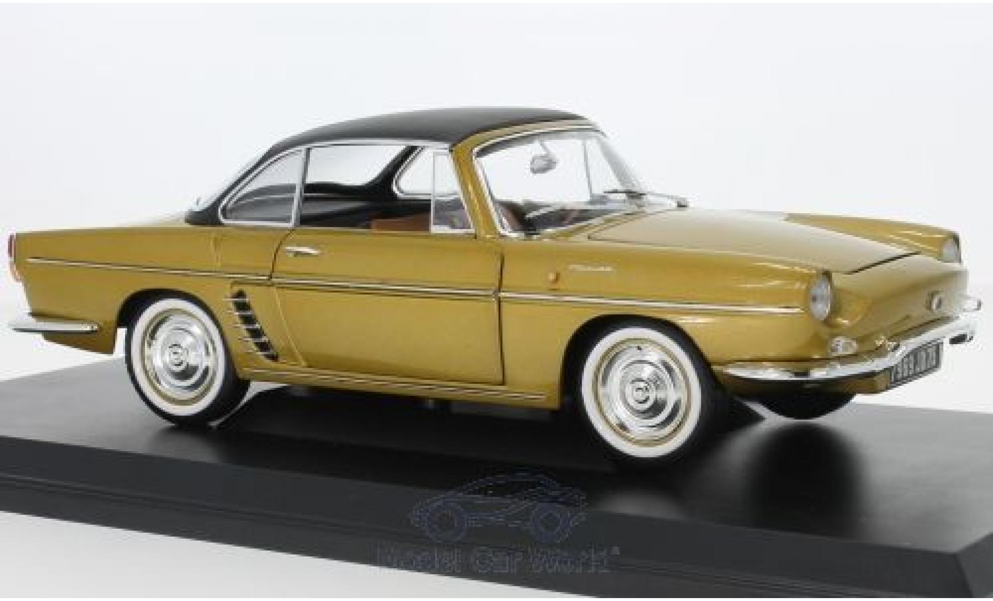 Renault Floride 1/18 Norev gold 1959 SoftTop liegt ein modelauto