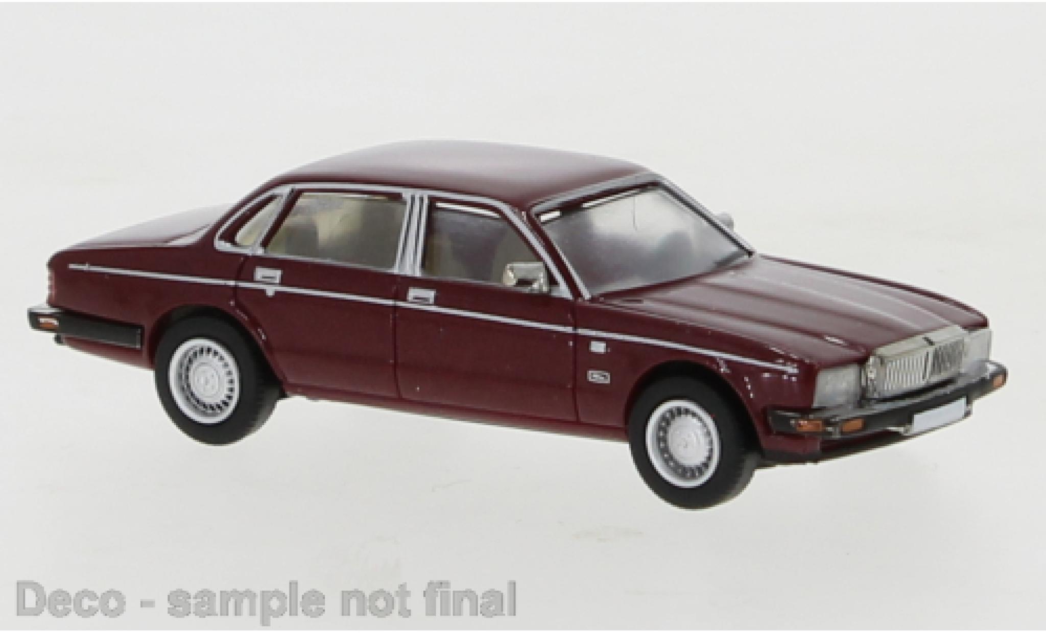 Jaguar XJ 1/87 PCX87 40 metallic rood 1986 modelauto