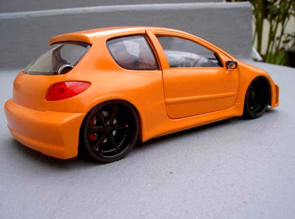 Peugeot 206 WRC street racing oranje 1/18 Solido