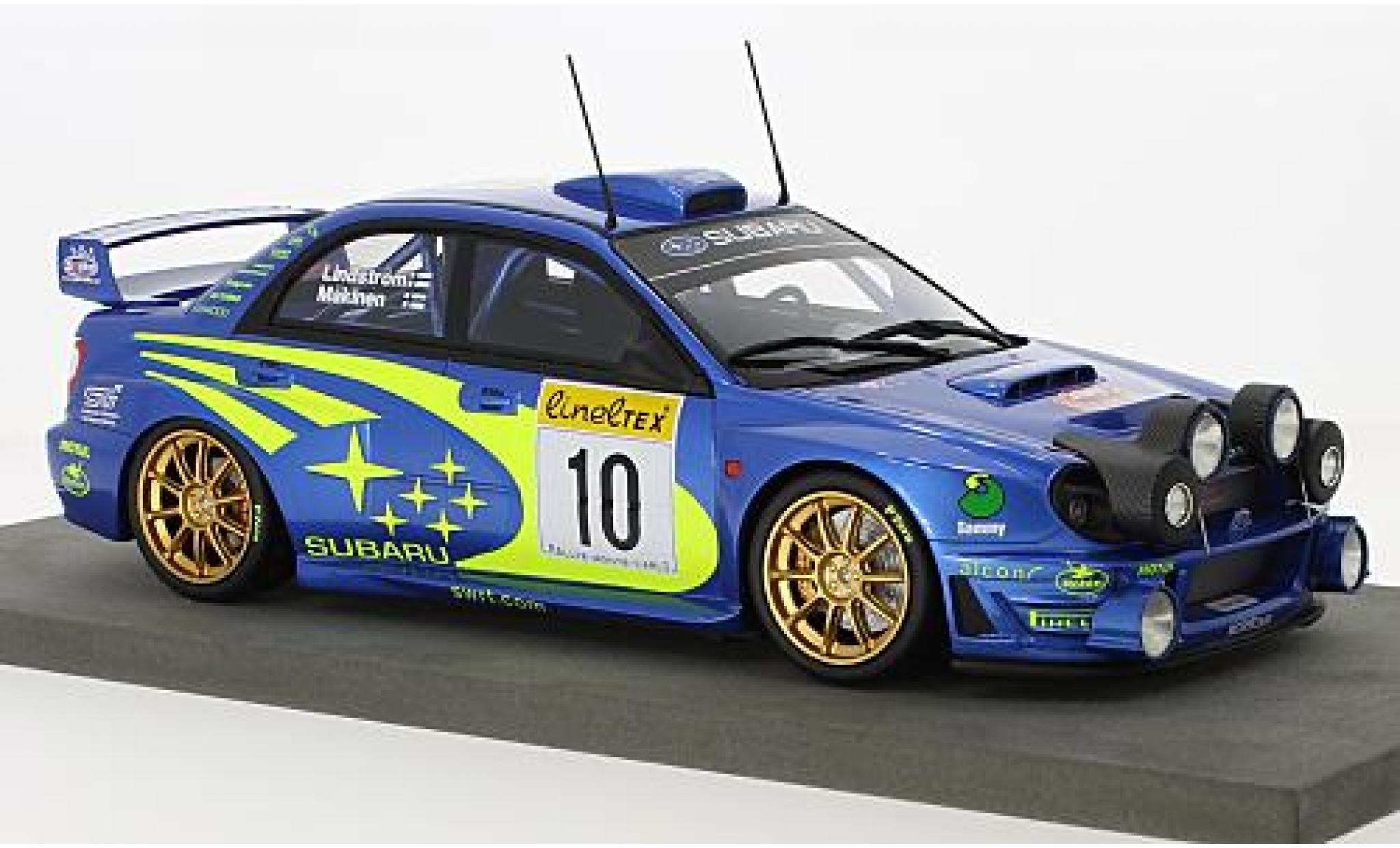 Subaru Impreza 1/18 Topmarques Collectibles S7 No.10 Rallye WM Rallye Monte Carlo 2002 avec Zusatzscheinwerfer T.M&auml;kinen/K.Lindstr&ouml;m modelauto