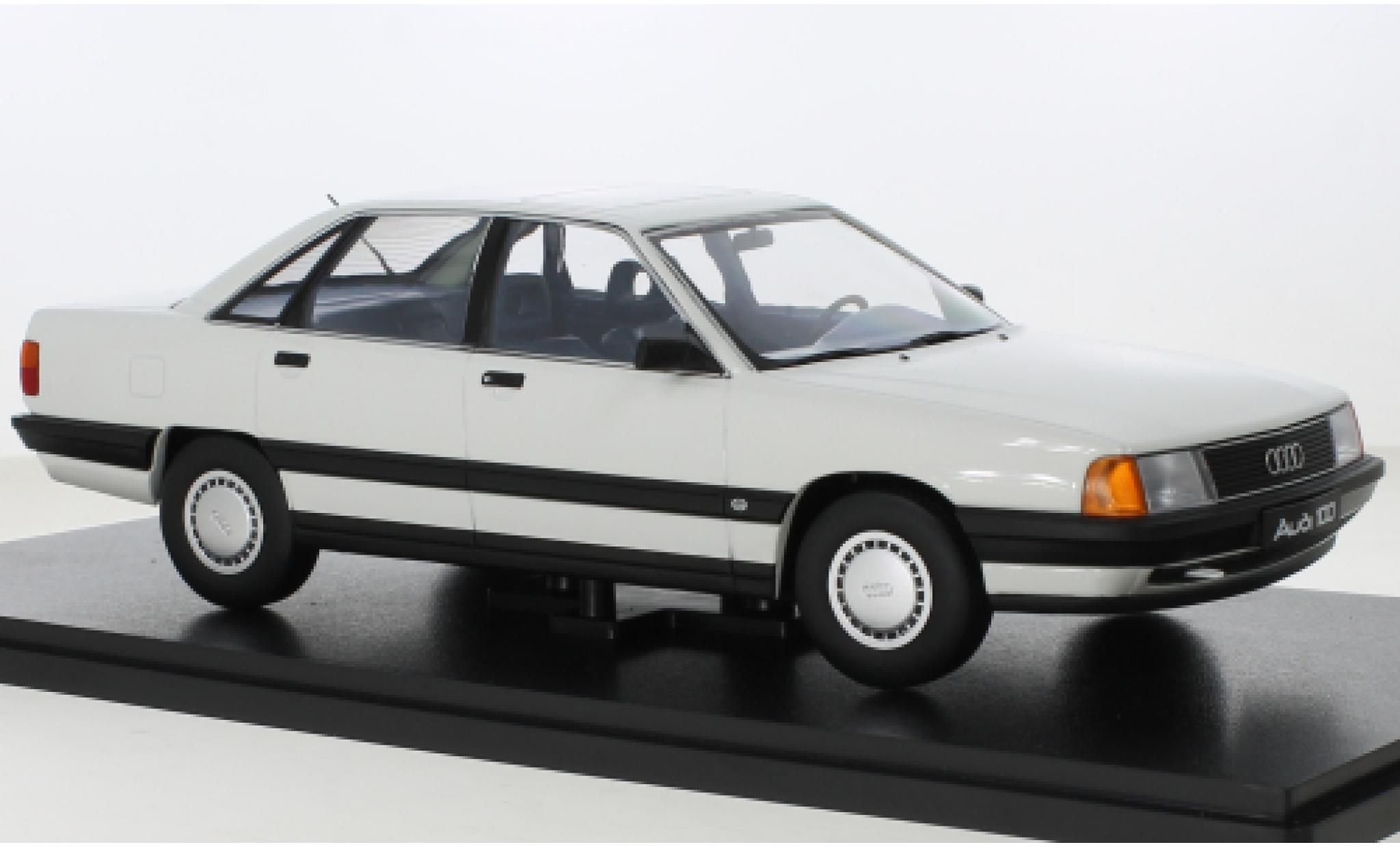 Audi 100 1/18 Triple 9 Collection (C3) wit 1989 modelauto