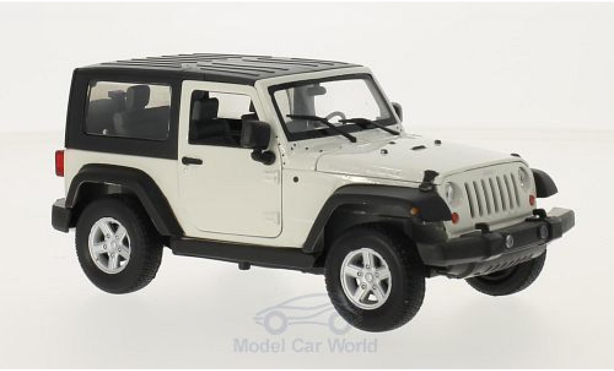 Jeep Wrangler 1/24 Welly wit/zwart 2007 modelauto
