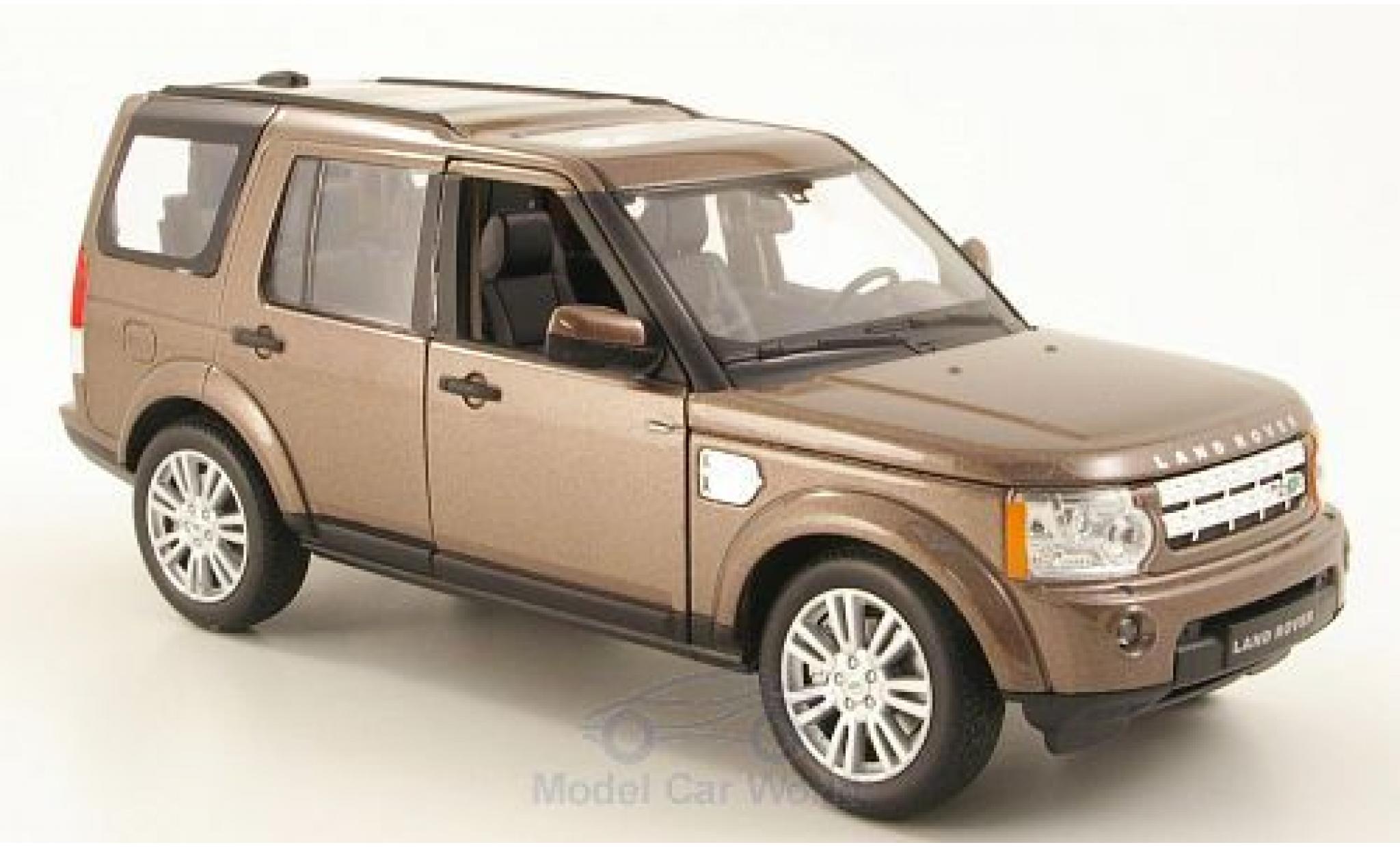 Land Rover Discovery 1/24 Welly 4 metallic bruin modelauto
