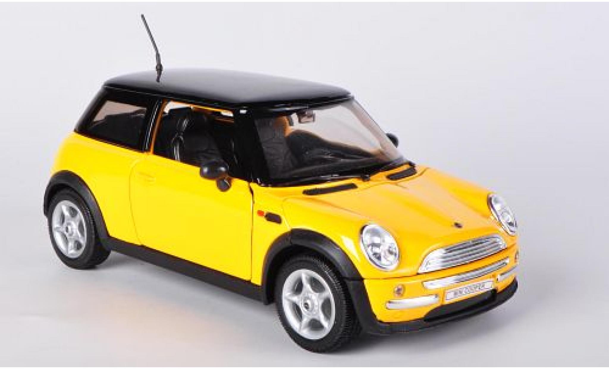 Mini Cooper 1/24 Welly geel sans Vitrine modelauto