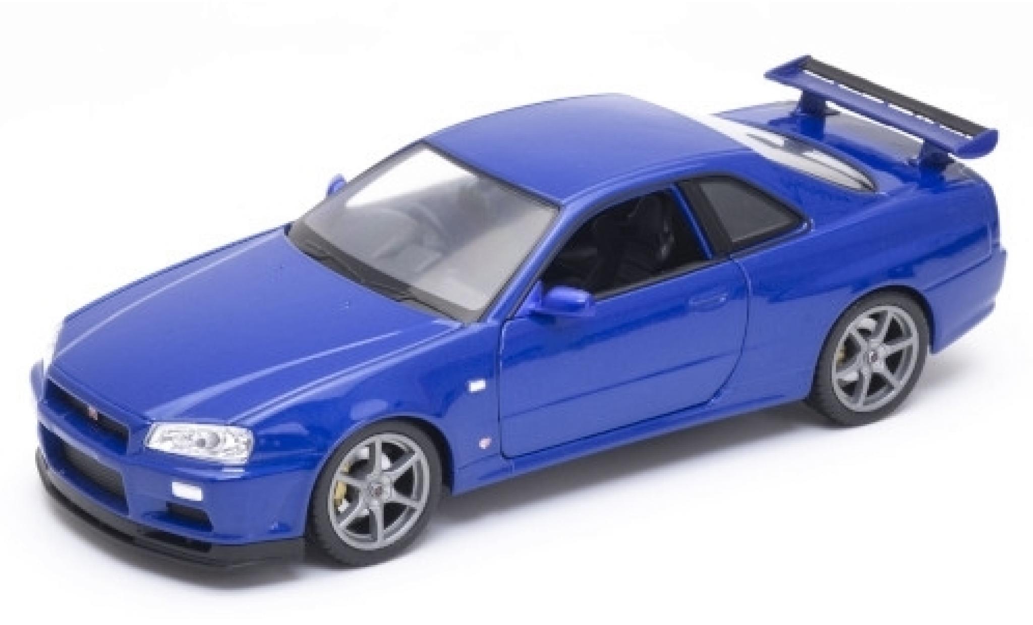 Nissan Skyline 1/24 Welly GT-R (R34) metallic blauw RHD modelauto