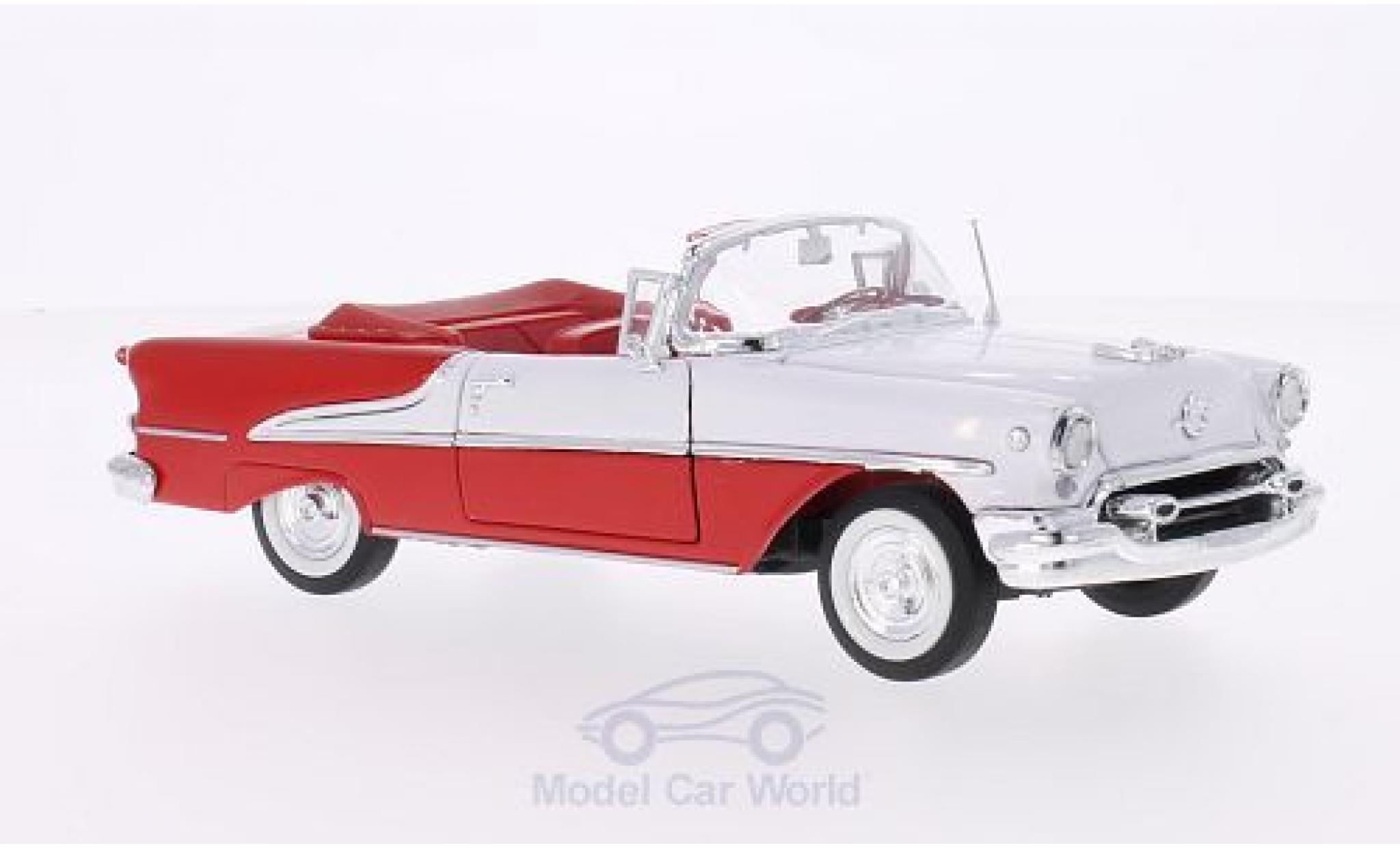 Oldsmobile Super 88 1/24 Welly Cabriolet rood/wit 1955 modelauto