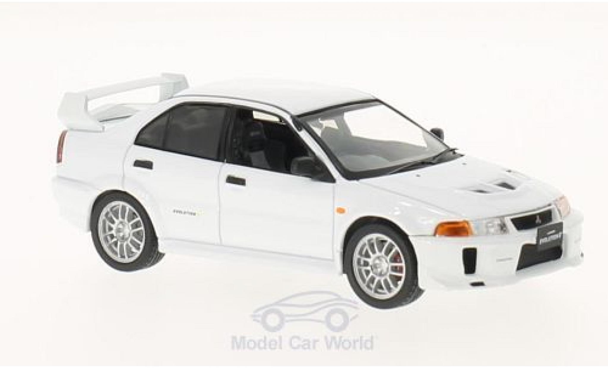 Mitsubishi Lancer 1/43 WhiteBox Evo V wit RHD 1998 modelauto