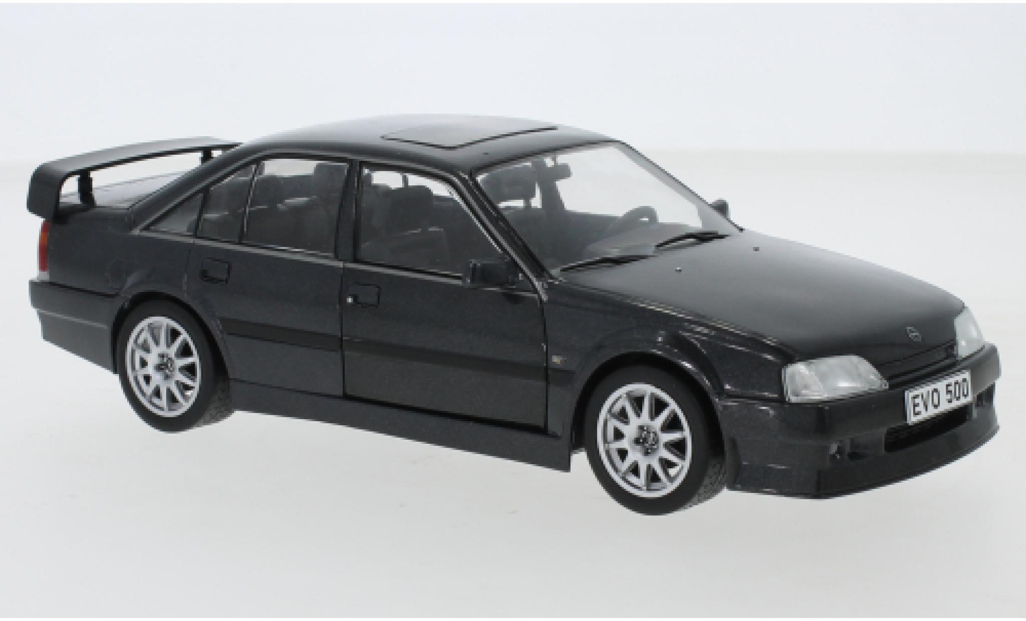 Opel Omega 1/24 WhiteBox Evolution 500 zwart 1991 modelauto