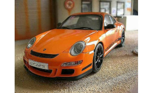 Porsche 911 GT3 RS 1/18 Autoart oranje jantes zwart modelauto