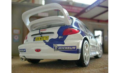 Peugeot 206 WRC 1/18 Solido 1999 # 15 Clarion Panizzi wit modelauto